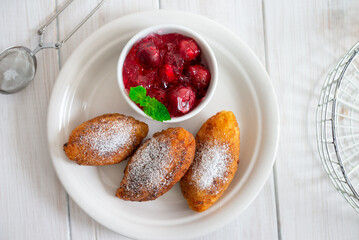 Fried patties with cherries and strawberries, homemade food