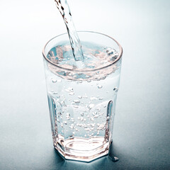 water pouring into glass