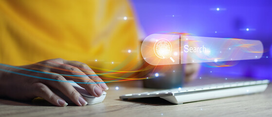 Data Search Technology Search Engine Optimization. man's hands are using a computer keyboard to...