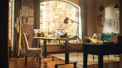 Laptop with New Sneaker Design Project Opened in 3D Editing Software. Portable Computer Standing on the Desk in the Modern Loft Workspace. In the Background Open Space Studio with City Window View.