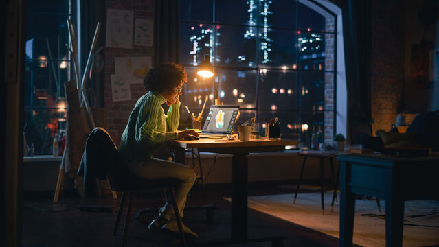 Hispanic Female Designer Changes Colour of 3d Model of the Shoe, Creating Footwear Design on her Laptop Computer in the Evening. Girl Working Remotely. Graphic Designer Concept.