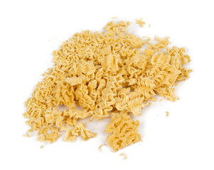 crumbled briquette of dry instant noodles on a white background