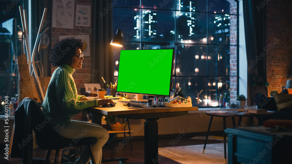 Fototapete Diverse Professional Freelancer Working on Personal Computer with Green Screen Chromakey on Display From Home. Woman Looking at Monitor, Browsing Through the Internet, Using Desktop PC.