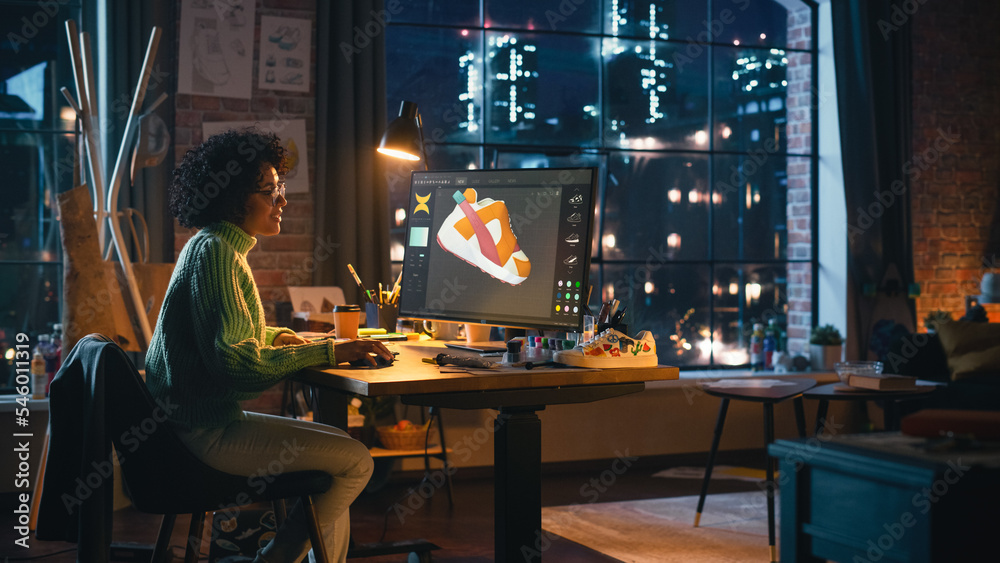 Poster multiracial female designer comes up with design of sneakers by reproducing it in the software for 3