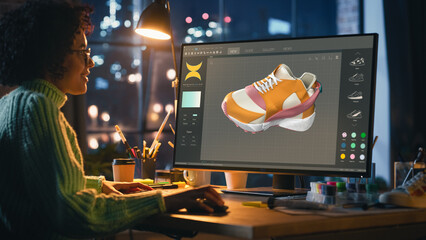 Black Teenage Woman Creating and Rendering 3D Model of Unique Sneaker on Powerful Personal...