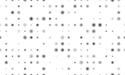 Seamless background pattern of evenly spaced black sushi roll symbols of different sizes and opacity. Vector illustration on white background