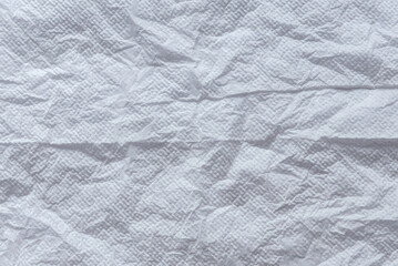 White crumpled tissue background and texture.