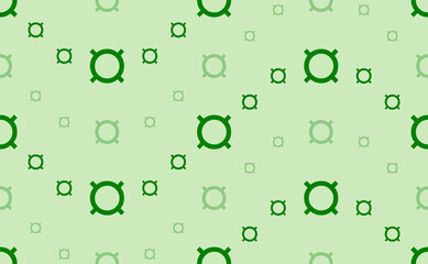 Seamless pattern of large and small green currency signs. The elements are arranged in a wavy. Vector illustration on light green background