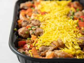 Southeast Asian-style fried rice with stir-fried meat and various vegetables