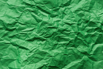 Green crumpled paper for background.