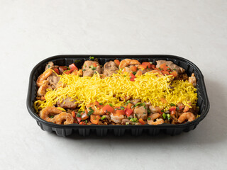 Southeast Asian-style fried rice with stir-fried meat and various vegetables