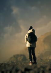 Lone teenage girl in a white jacket and backpack stands in a misty rocky landscape under a cloudy sky. Rear view. 3D render.