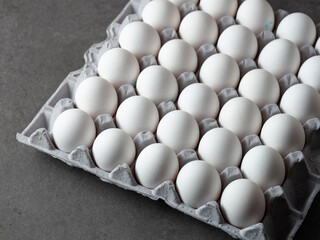 white eggs in a carton