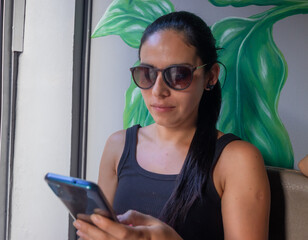 girl looking at her phone
