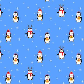 Christmas vector seamless pattern with cute little penguins on blue background. Christmas wrapping paper for children. Vector illustration