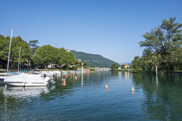 Fototapeta na wymiar The canal of Lavena in the Lake Lugano
