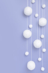 Fototapeta na wymiar Christmas composition, winter background, snowfall from white balls, blue background.