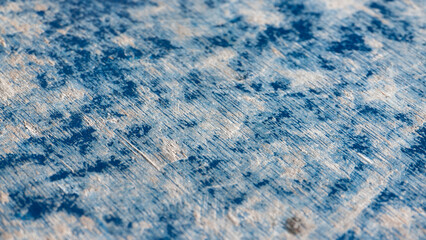 Tablón de madera pintado de azul desgastado 