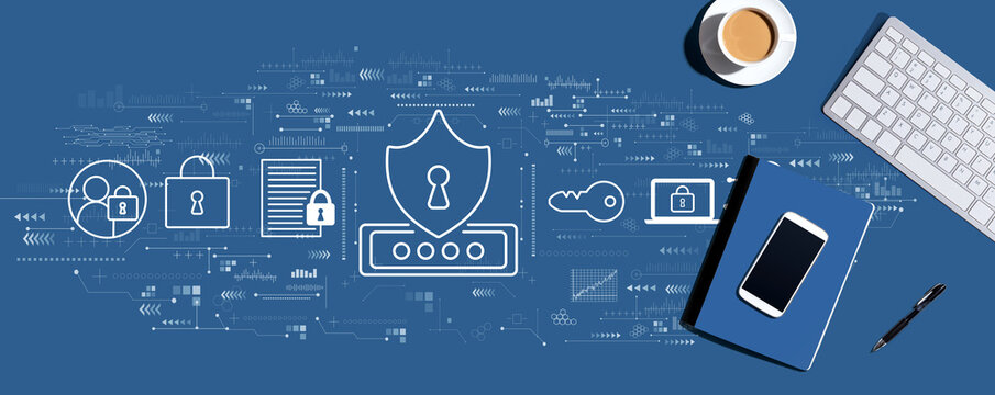 Cyber security theme with a computer keyboard and office items