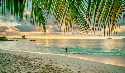 Beautiful sunset in a tropical island. Holiday concept.