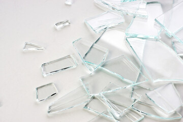  broken glass on white background closeup                          
