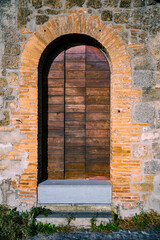 Fototapeta premium italian door in the town of Orvieto, Italy