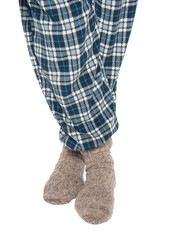 Man legs in the wool socks and checkered pants isolated