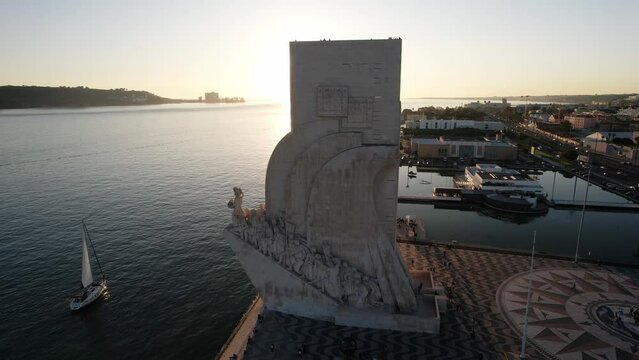 Reveal of historical landmark Monument to the Discoveries and Jeronimos Monastery in Lisbon, Portugal