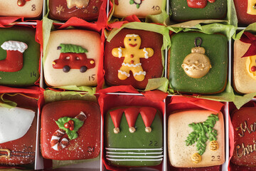 Delicious Christmas cookies set in a gift box. Advent calendar to count the days in anticipation of...
