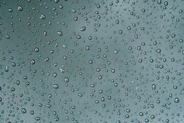 Close-up of a glass surface covered in waterdrops