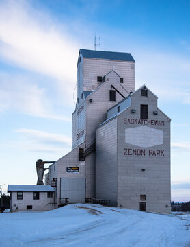 Vertical shot of Zenon Park grain elevator on a snowy winter day, Wadena, SK, Canada