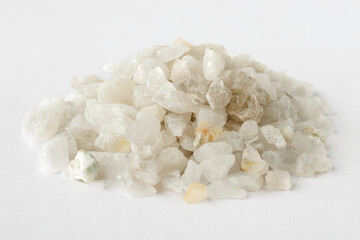 Pile of stones Quartz, natural mineral on a white background. Close-up