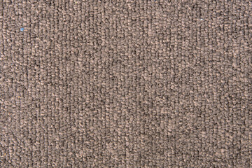 Fototapeta na wymiar Carpet texture, detailed fabric surface, gray evenly illuminated seamless carpet
