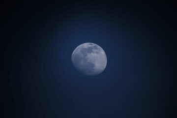 Beautiful view of the moon in a dark blue sky.