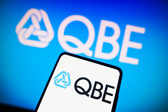 November 14, 2022, Brazil. In this photo illustration the QBE Insurance Group Limited logo seen displayed on a smartphone and in the background.