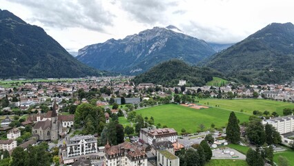 Fototapeta premium View of a small town surrounded by mountains. Interlaken, Switzerland.