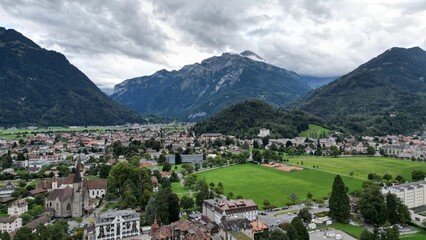 View of a small town surrounded by mountains. Interlaken, Switzerland.