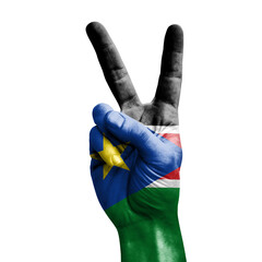 Hand making the V victory sign with flag of south sudan