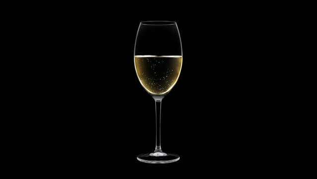 Crystal empty wineglass fills up with sparkling champagne on black background. Alcohol drink poured into goblet with bubbles rising to surface extreme closeup