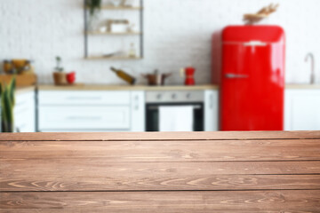 Empty wooden table in interior of modern kitchen