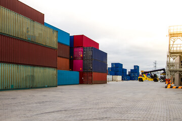Cargo containers. Cargo container yard. Stack of freight containers at the docks. Industrial yard. Import and export logistic concept.