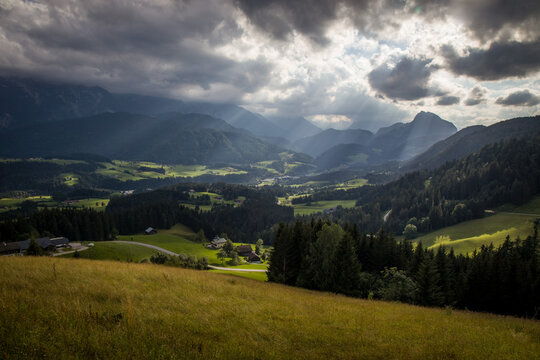 The beautiful view of the valley with rays of the sun. Postalmstrasse. Postalm scenic road Abtenau, Austria, Europe