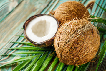 Fototapeta na wymiar fresh natural coconut on rustik wooden background