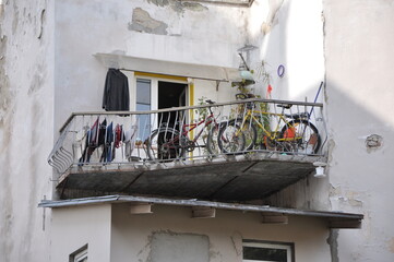 bicycles on the balcony of an old house