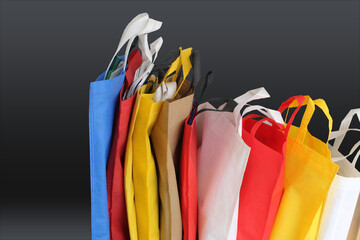 Beautiful Non Woven grocery shopping bags with black background. Assorted Colors Eco friendly bags...