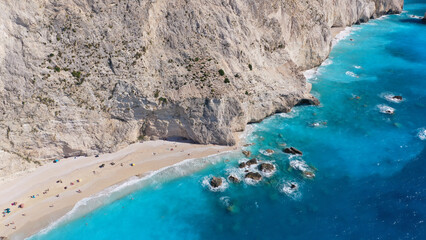 Aerial drone photo of paradise scenic bay surrounded by white cliffs and beach of Porto Katsiki in island of Lefkada, Ionian, Greece