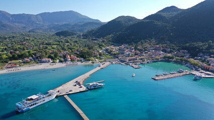 Obraz na płótnie Canvas Aerial drone photo of beautiful seaside village and bay of Vasiliki famous for surfing activities, Lefkada island, Ionian, Greece