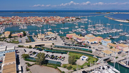 Obraz premium Aerial drone photo of famous marina of Lefkada island town with anchored yachts and sailboats, Ionian, Greece