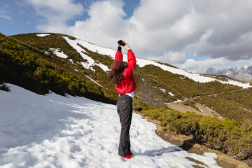 the girl with the red jacket and snow