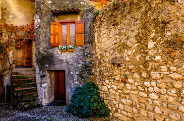 Naklejka premium historic old town and port of Malcesine - Italy